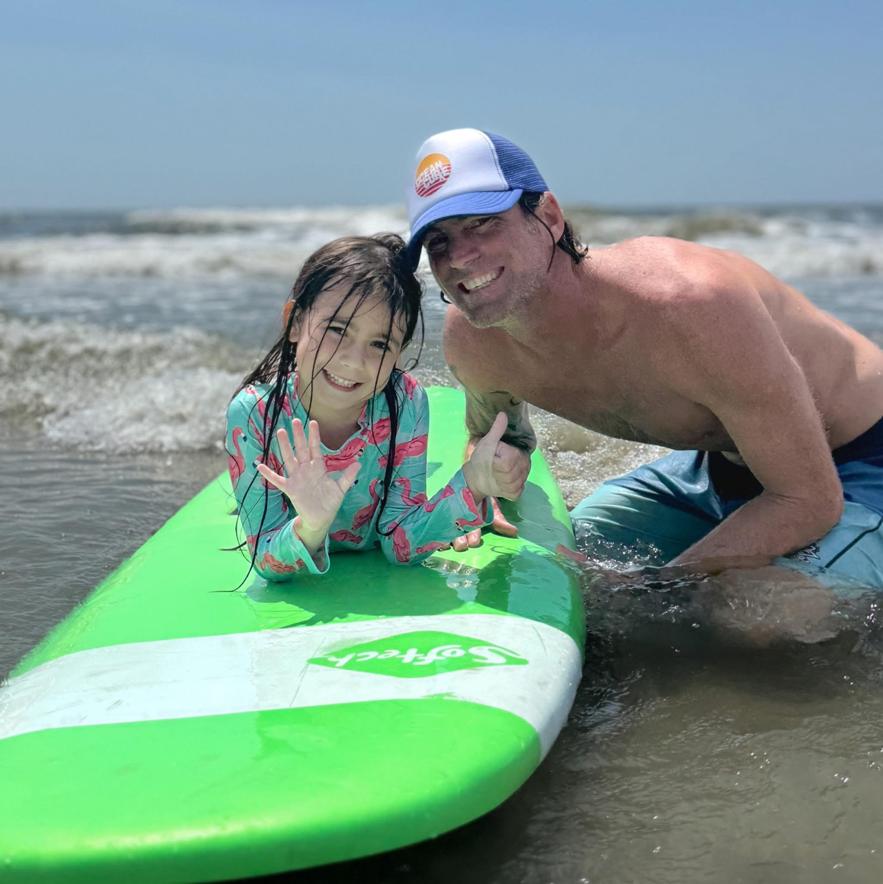Odysea surf instructor with student